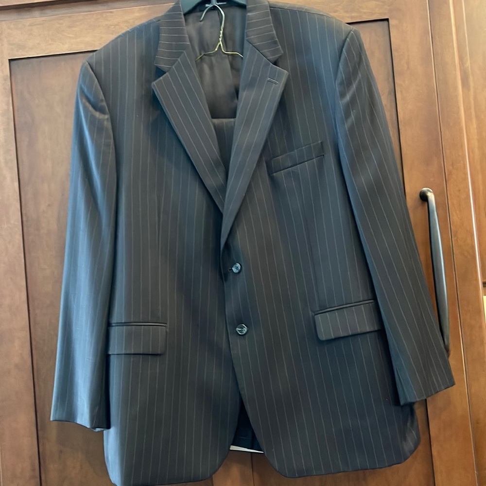 Worn once. Absolutely like new. Chaps 2 pc suit. 38x34. 48 L. 100% wool.